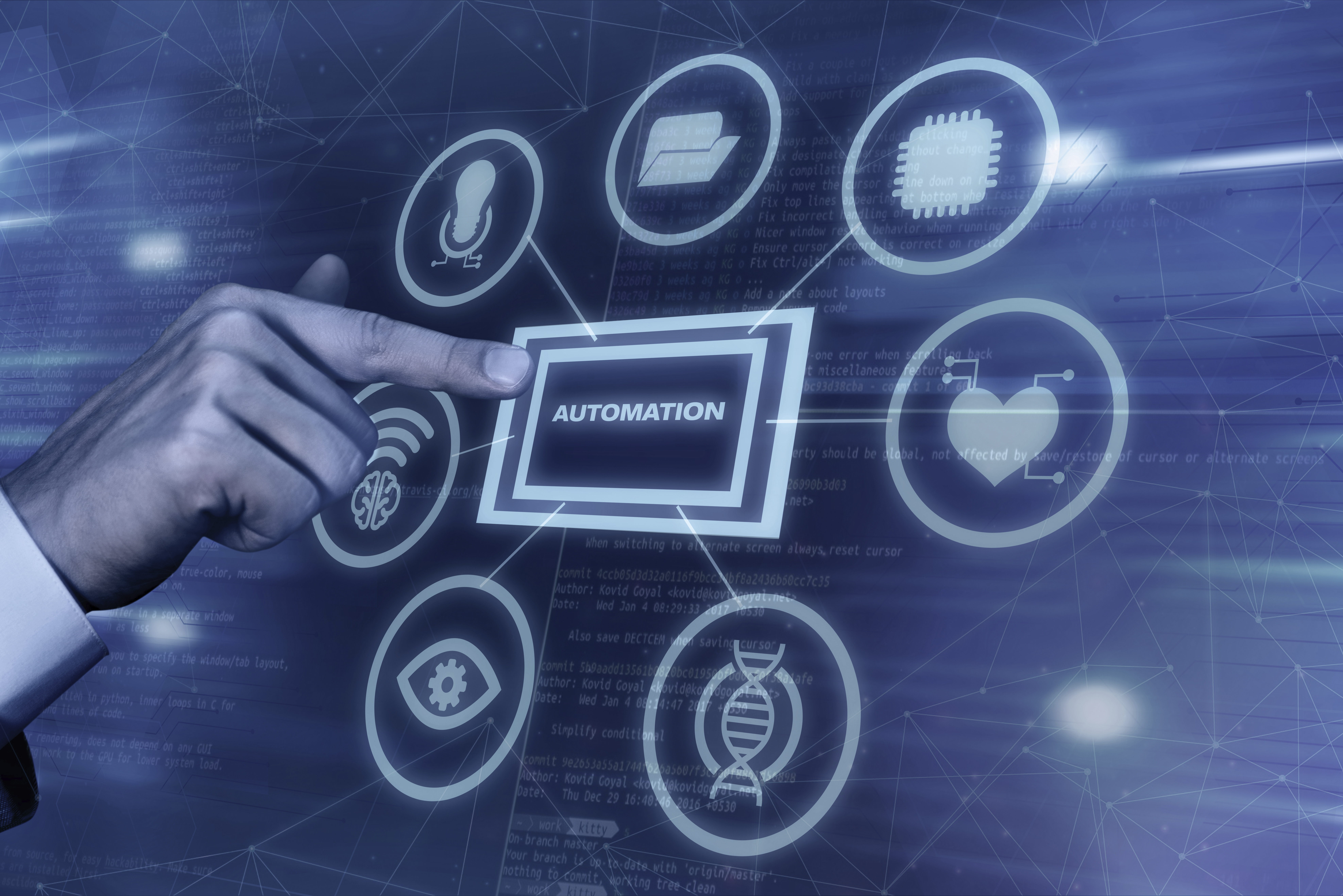 Un doigt pointe vers une interface virtuelle affichant le mot "AUTOMATION", entouré d’icônes représentant diverses technologies.